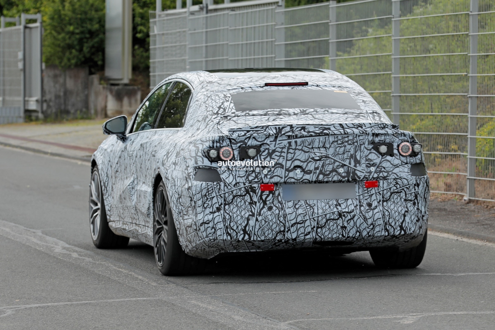 2026-mercedes-amg-c-class-ev-spied-testing-at-the-nurburgring-with-mismatched-wheels2-17190434880591115101290
