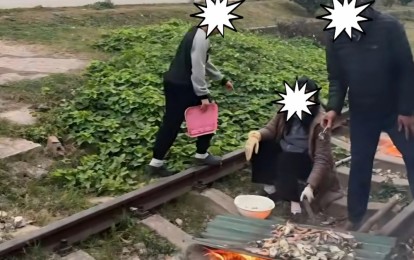 Nướng đồ ăn trên đường ray tàu hỏa, cặp vợ chồng ở Quảng Ninh bị xử phạt